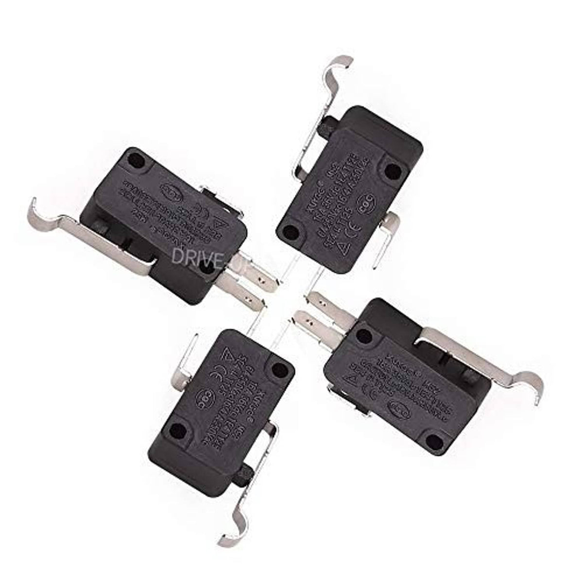 Four black micro switches with lever and metal prongs, multiple angles