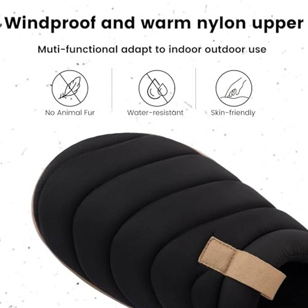 Black quilted slip-on slippers with beige pull tab and thick padded cushioning.