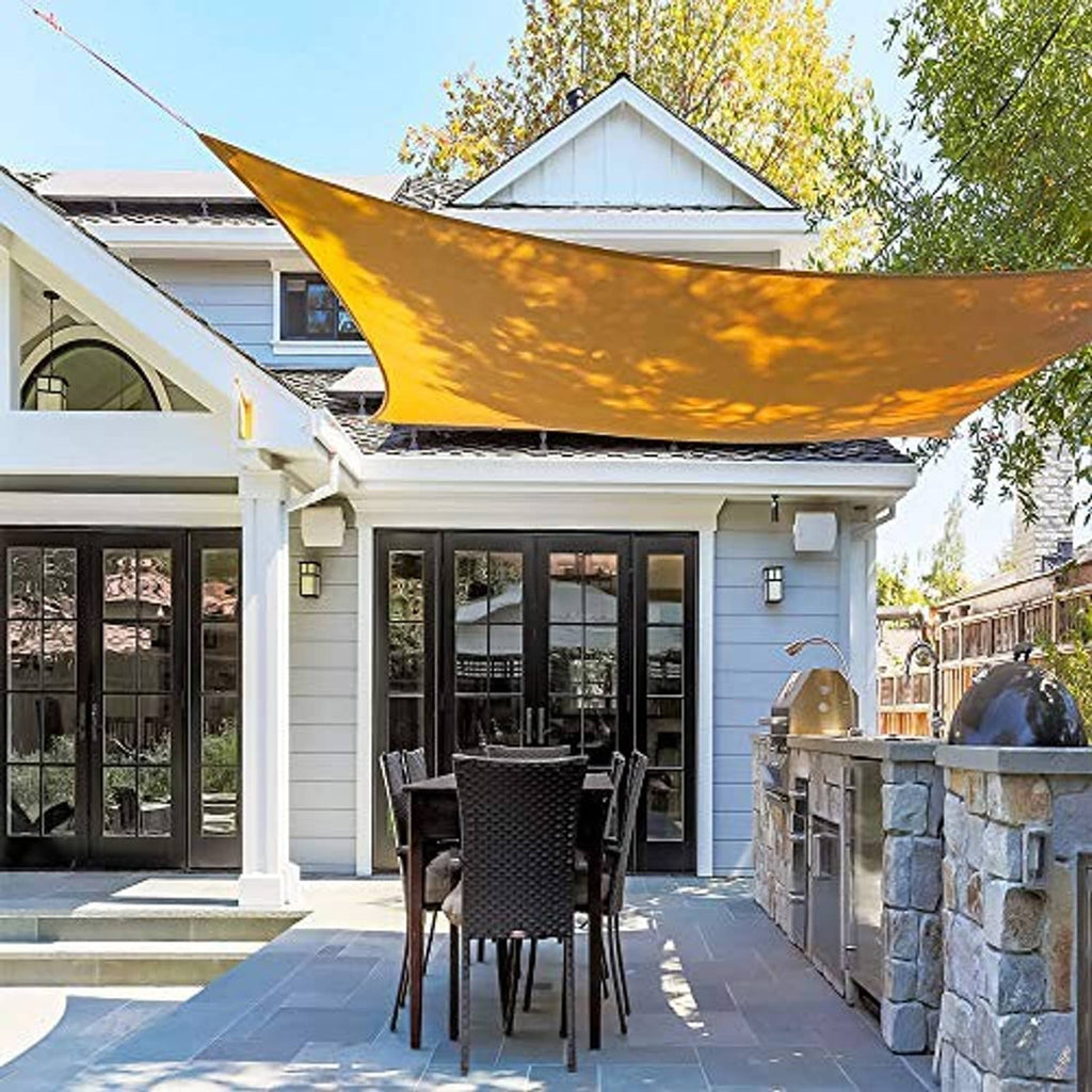 Tan shade sail stretched over patio area with secure corner fittings