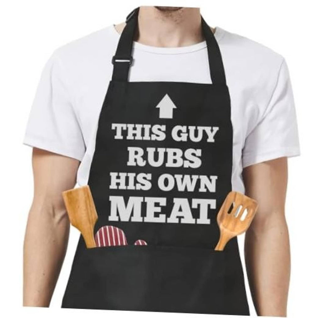 Black apron with adjustable straps and 'THIS GUY RUBS HIS OWN MEAT' text