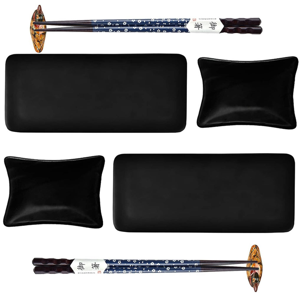 Black rectangular and square sushi dishes with blue patterned chopsticks