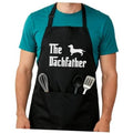 Black adjustable kitchen apron with Dachfather dog graphic and front pocket.