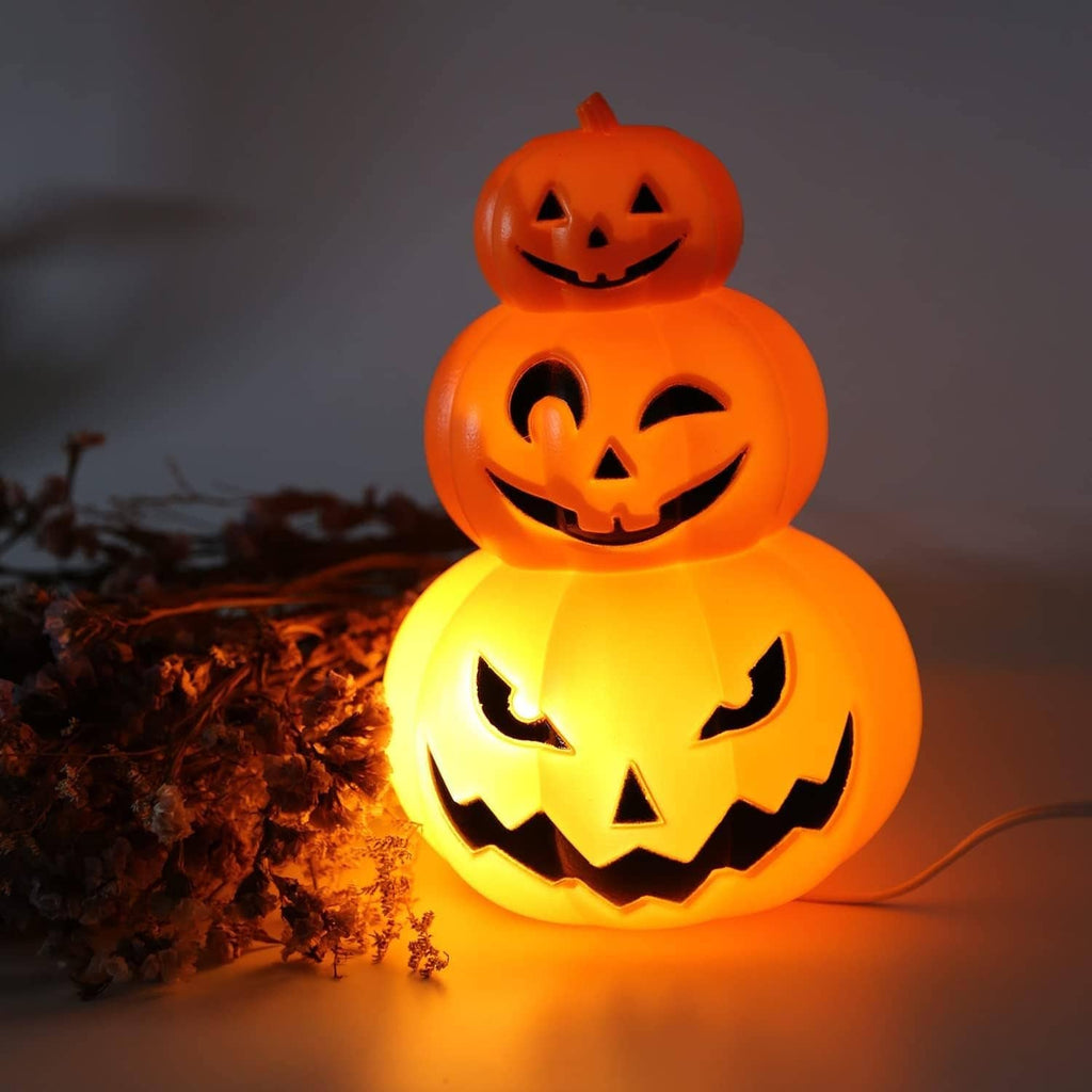 Stacked pumpkin-shaped LED night light with glowing orange jack-o’-lantern faces