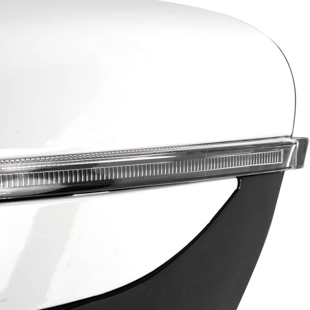 White vehicle fender edge with chrome trim and black lower panel