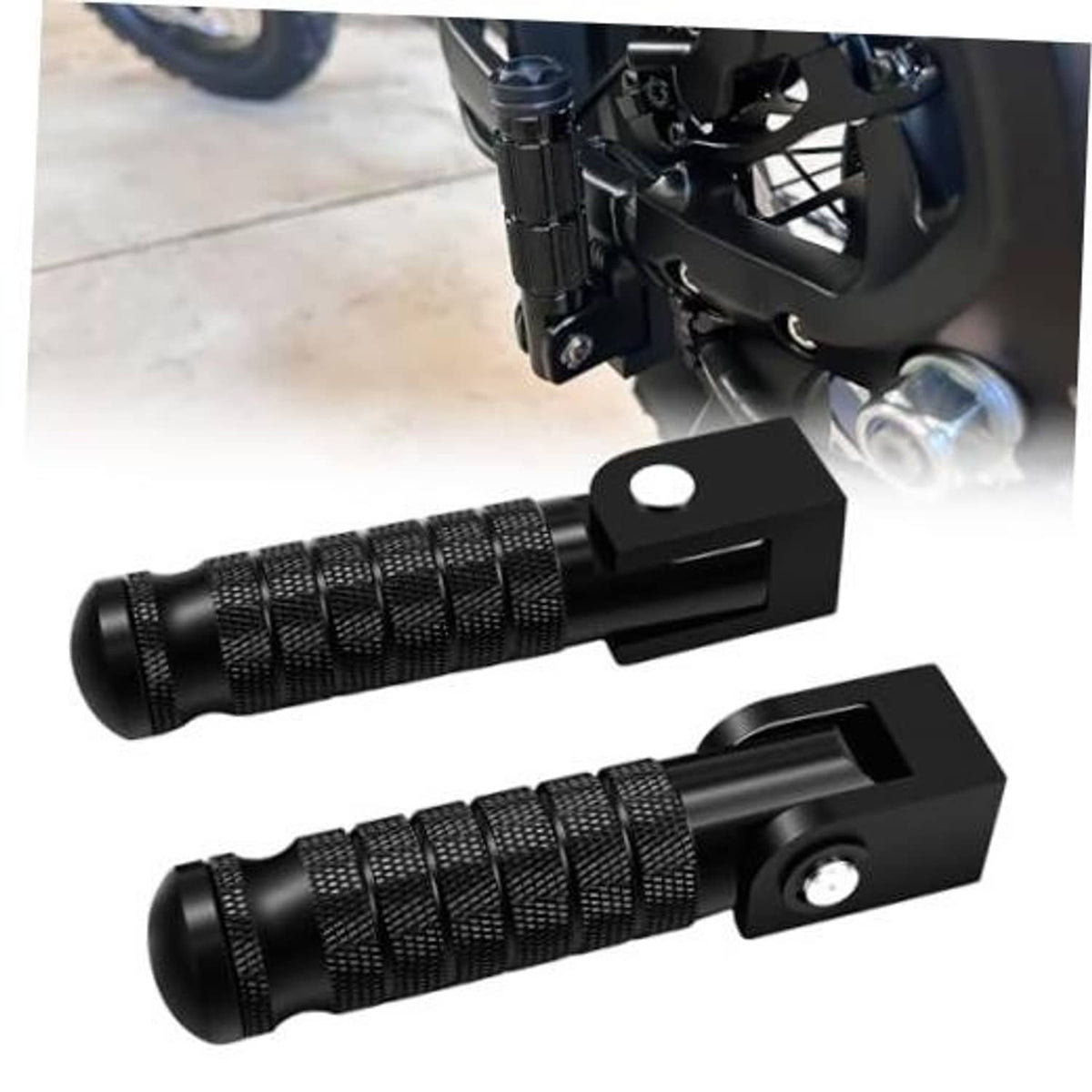Foldable black motorcycle foot pegs with textured grips and mounting bracket