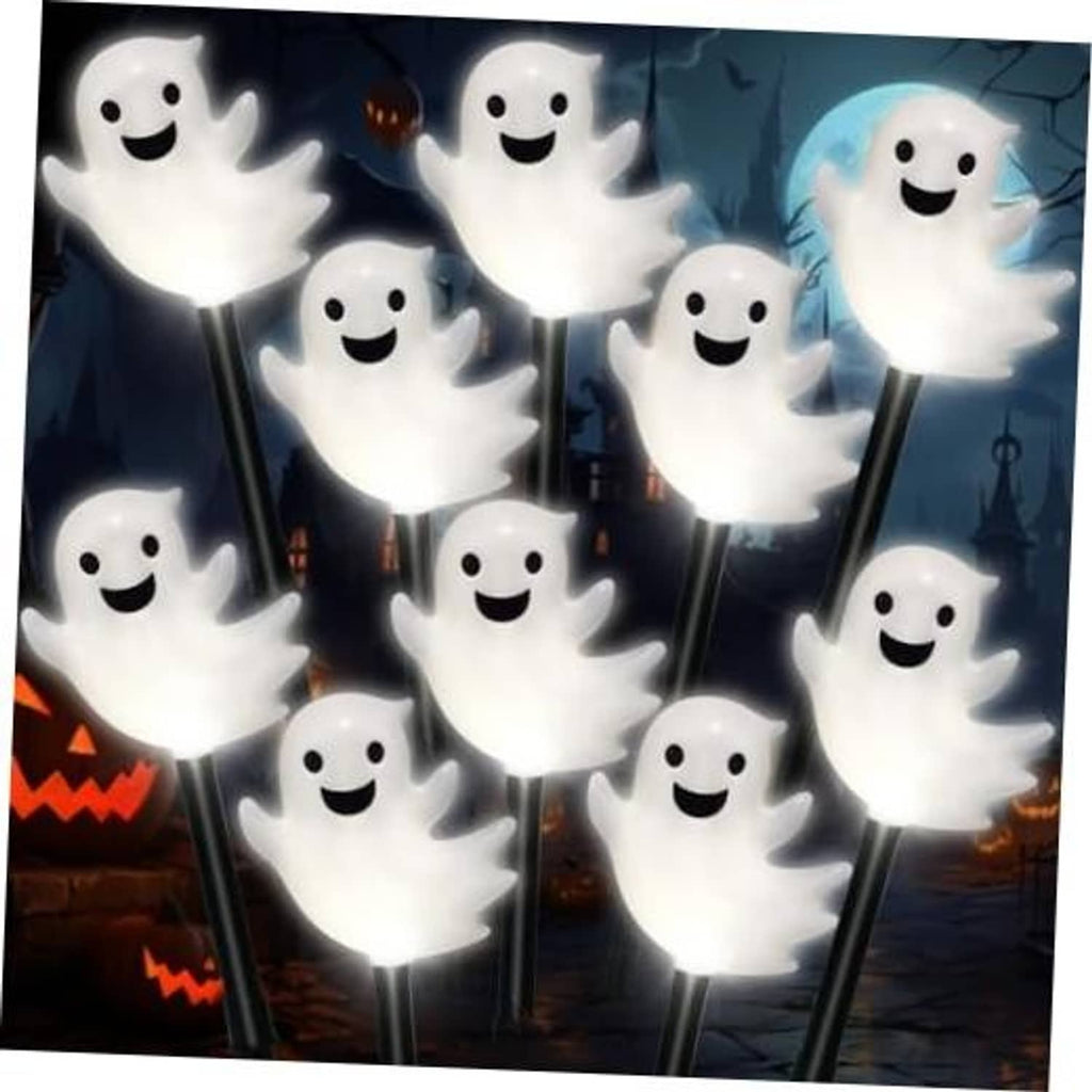 Set of glowing white ghost-shaped solar stake lights with smiling faces