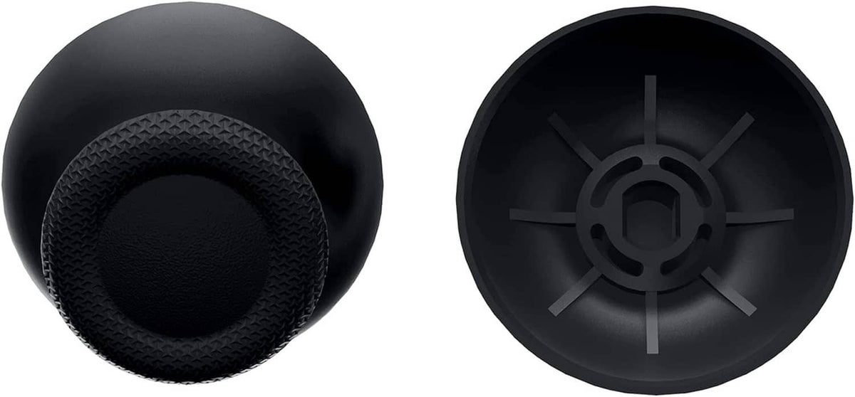 Black thumbstick caps with textured tops; view of underside cross-shaped socket