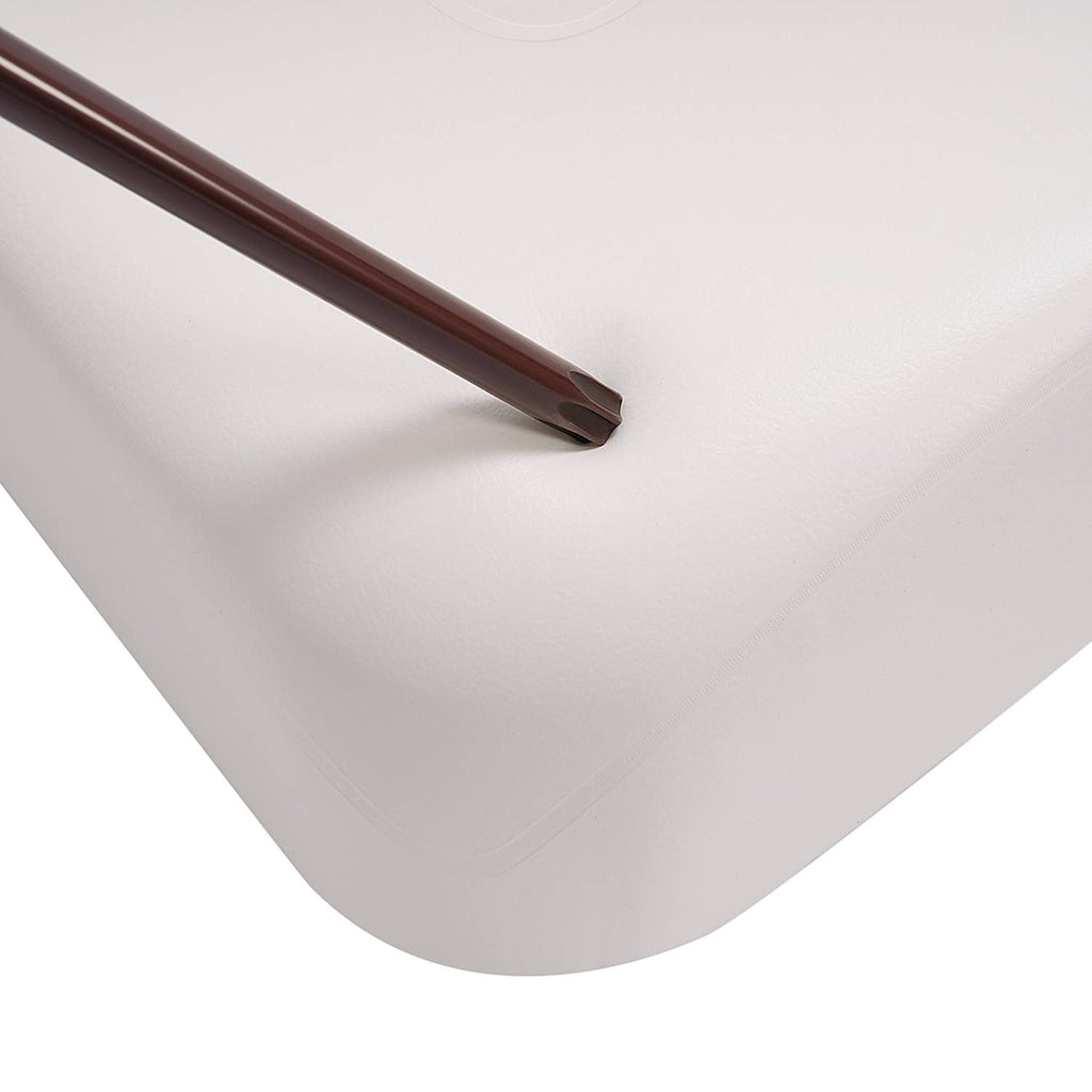 White seat back cushion corner with smooth edge and sewn seam