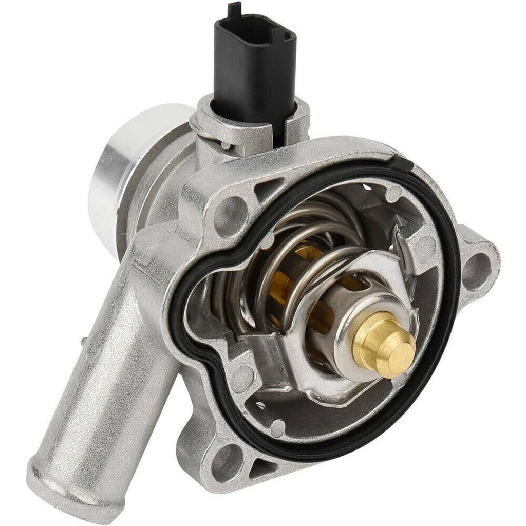 Thermostat housing assembly showing circular valve chamber and gold sensor pin
