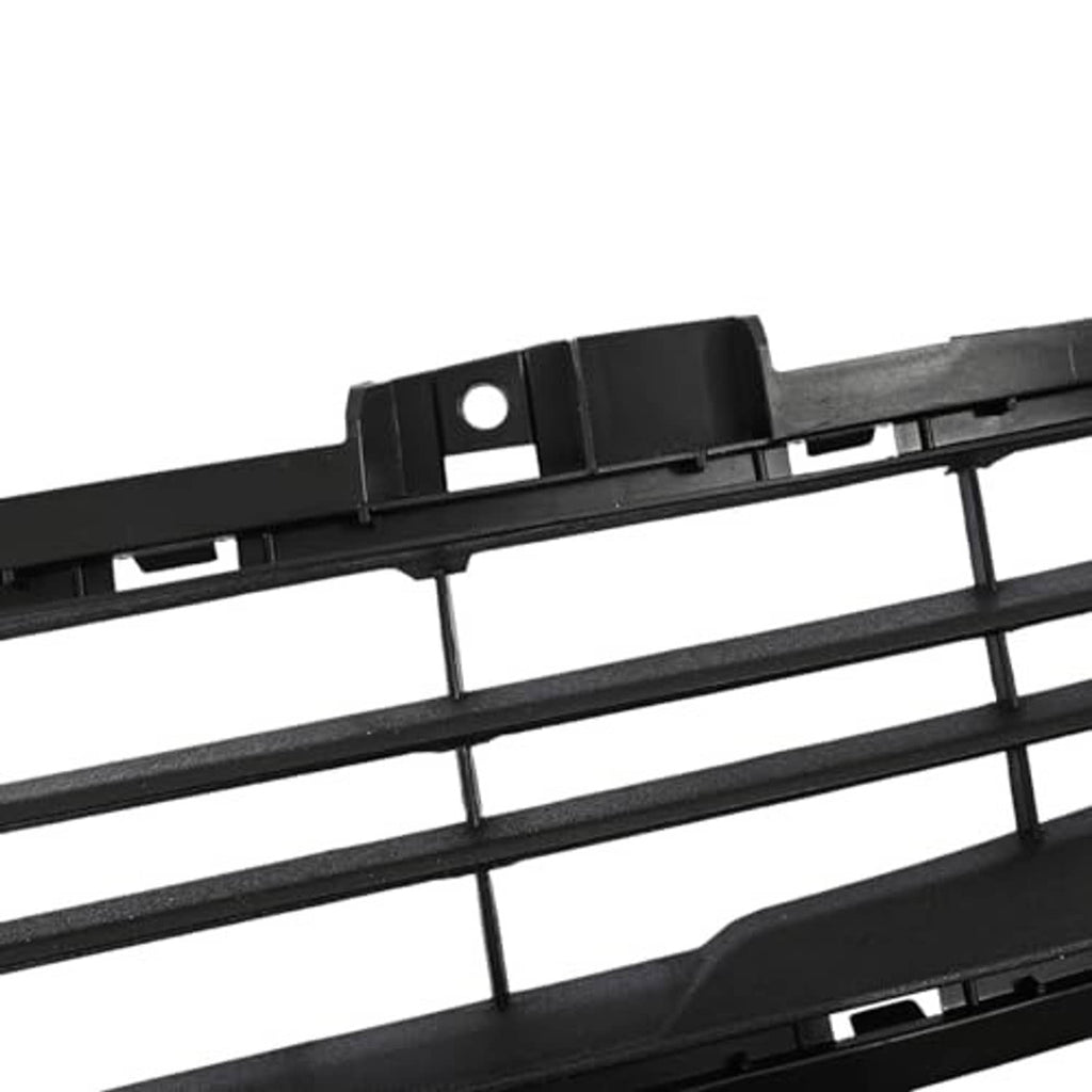 Close-up of black grille frame with mounting holes and plastic bracket tabs