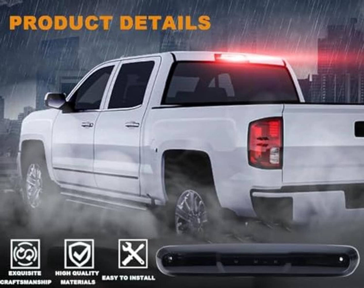 Third brake light on pickup rear, red LED glow, smoked housing with clear lens