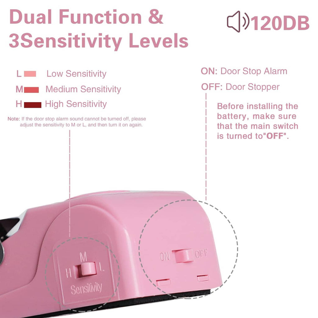 Pink door stop alarm showing sensitivity switch positions on the side