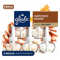 Glade Cashmere Woods scented oil refills, five plug-in bottles on retail pack
