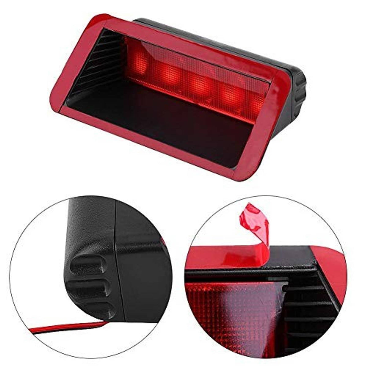 Third brake light with red lens and black housing, close-up of mounting corner