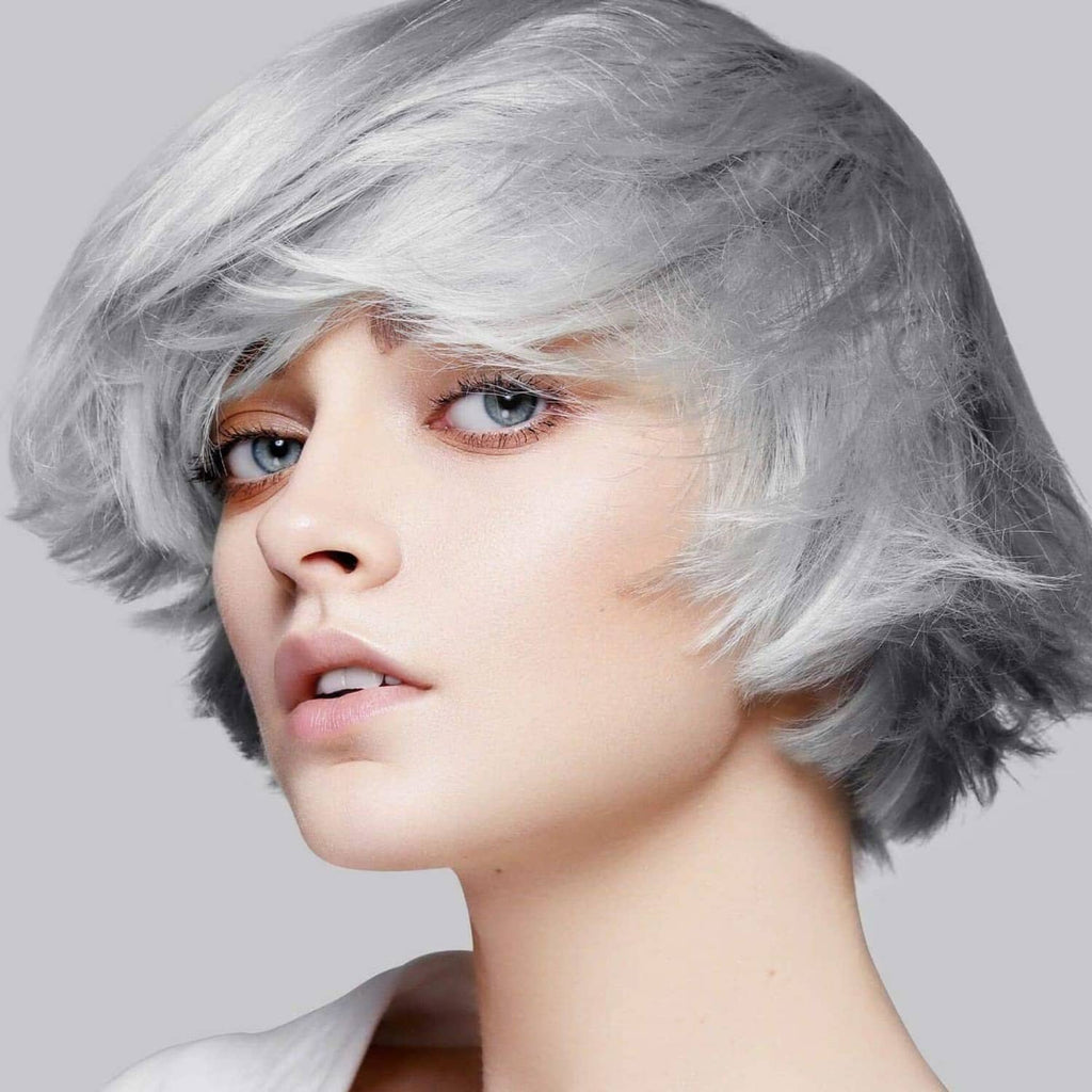 Ice lift-up hair bleach result: short silver-gray hair on model