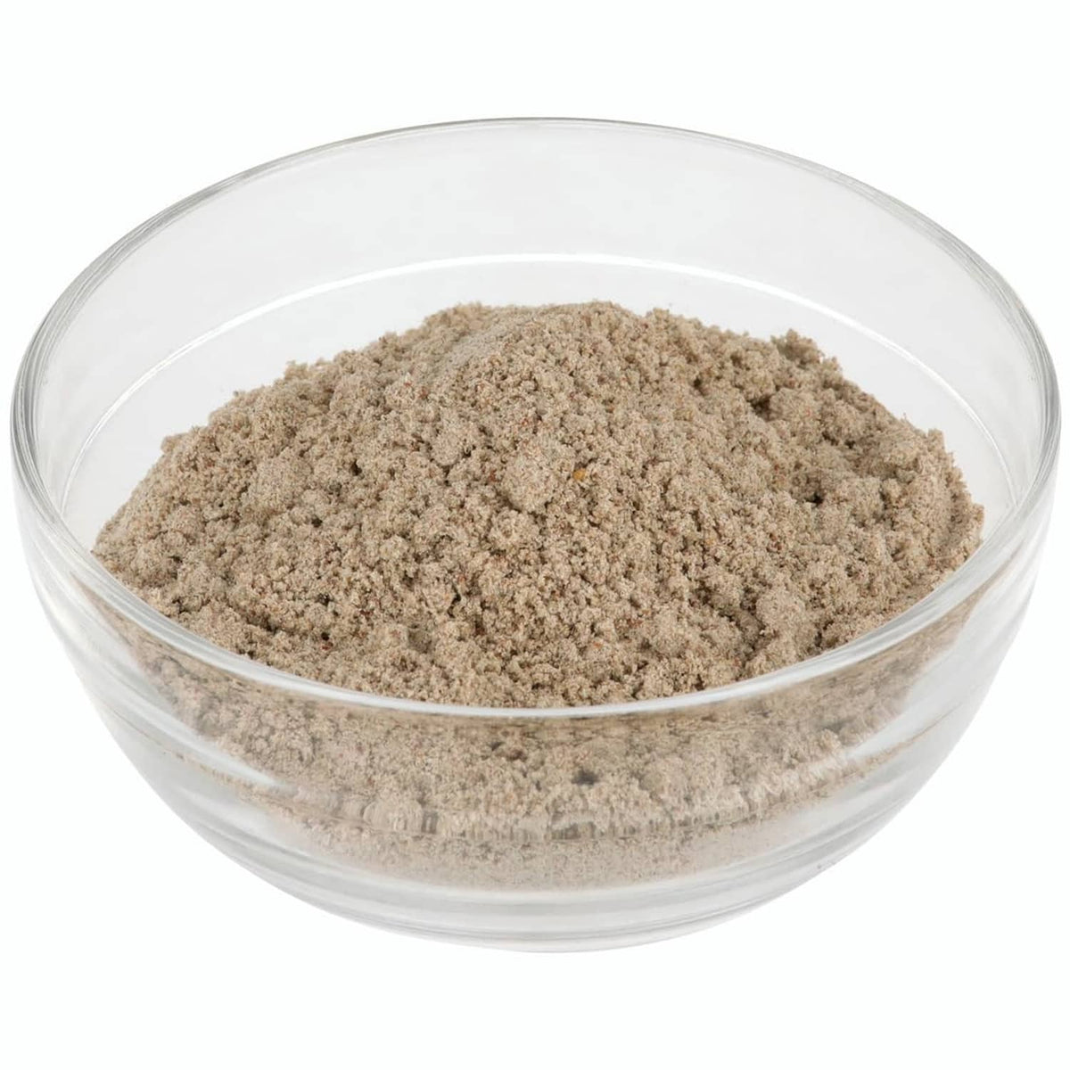 Instant au jus gravy mix powder in clear glass bowl, light brown granules