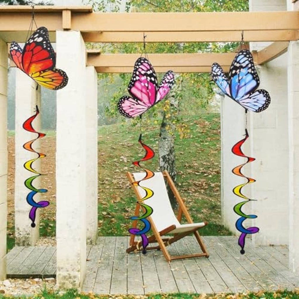 Three outdoor hanging butterfly windsocks with multicolor spiral ribbon streamers