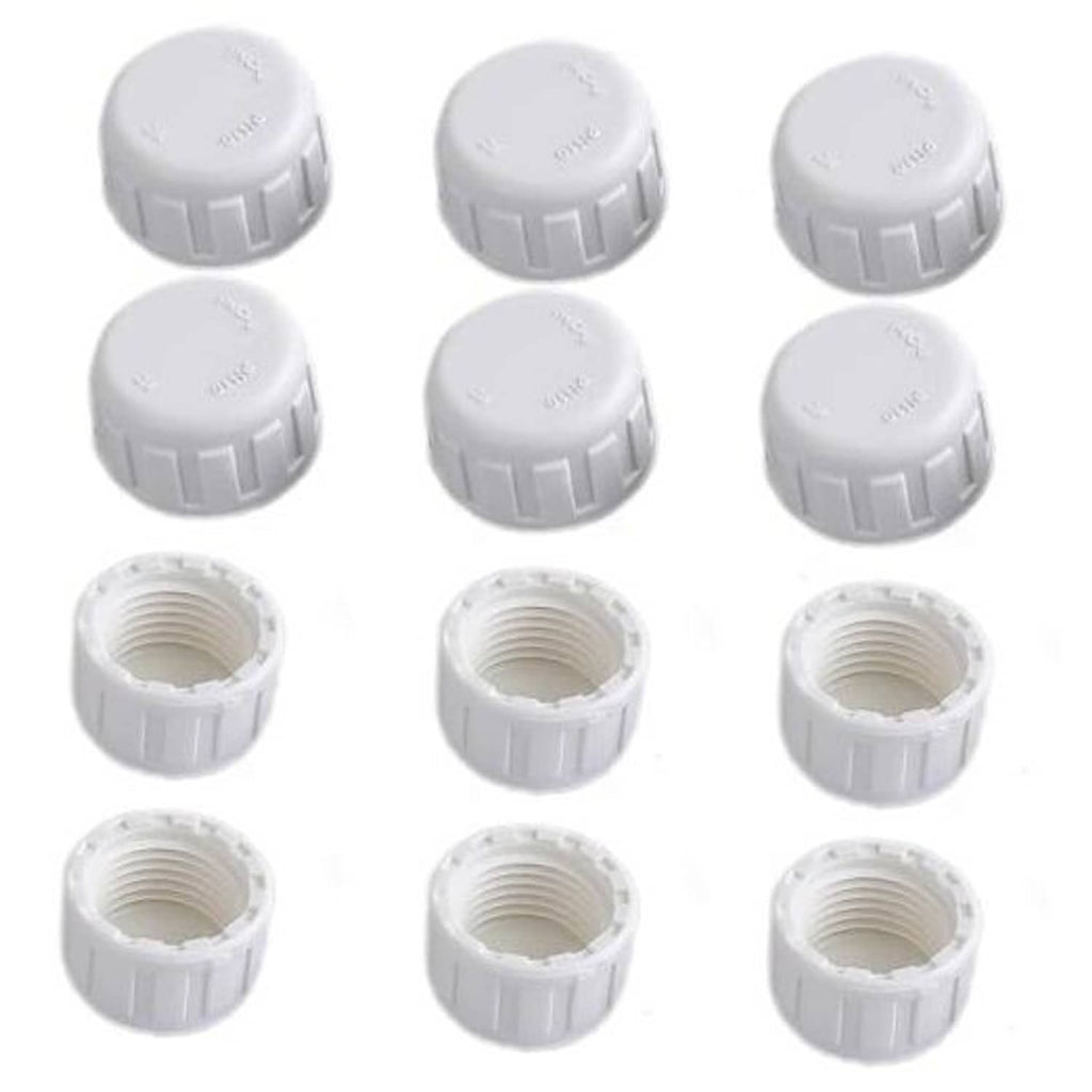 Twelve white PVC pipe end cap plugs with female threads, round tops