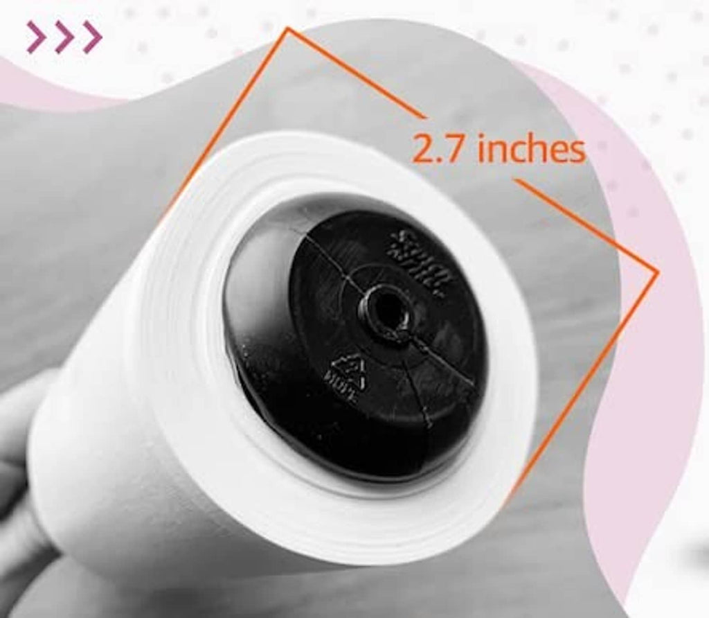 Close-up of a lint roller refill roll inside a white-lined storage case