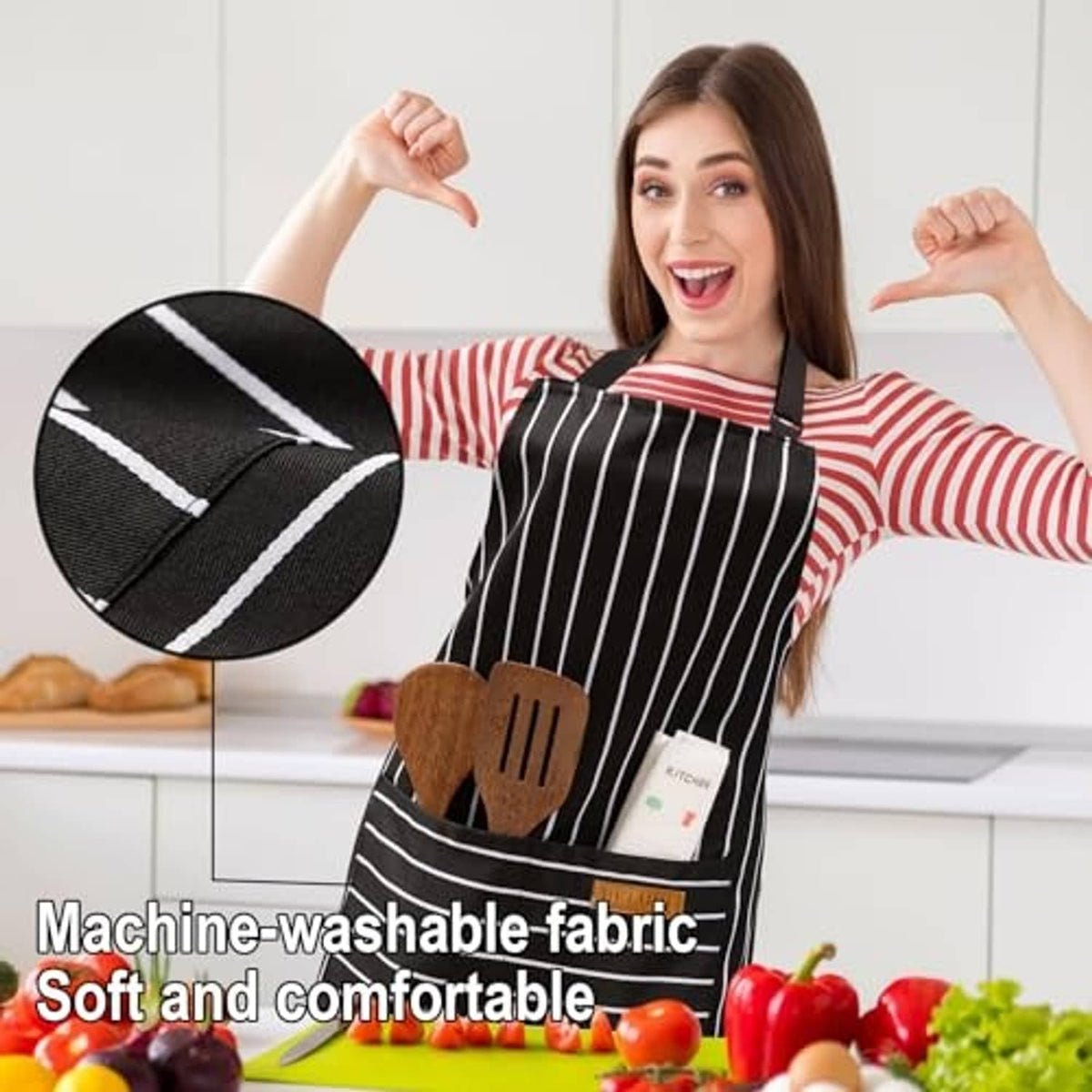 Black striped bib apron worn by model with two front pockets holding utensils
