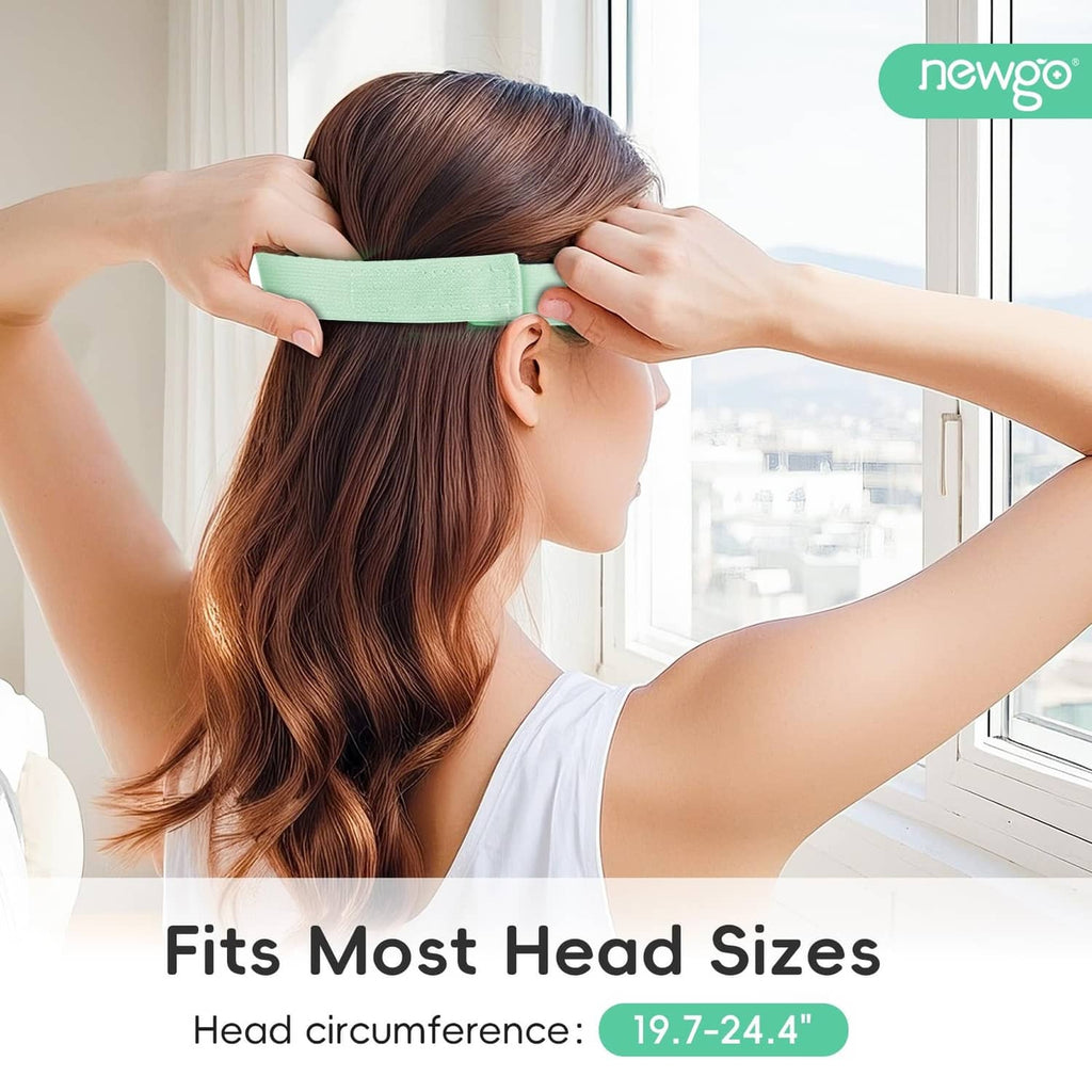 Green cooling gel eye mask being worn, elastic strap across the back of head