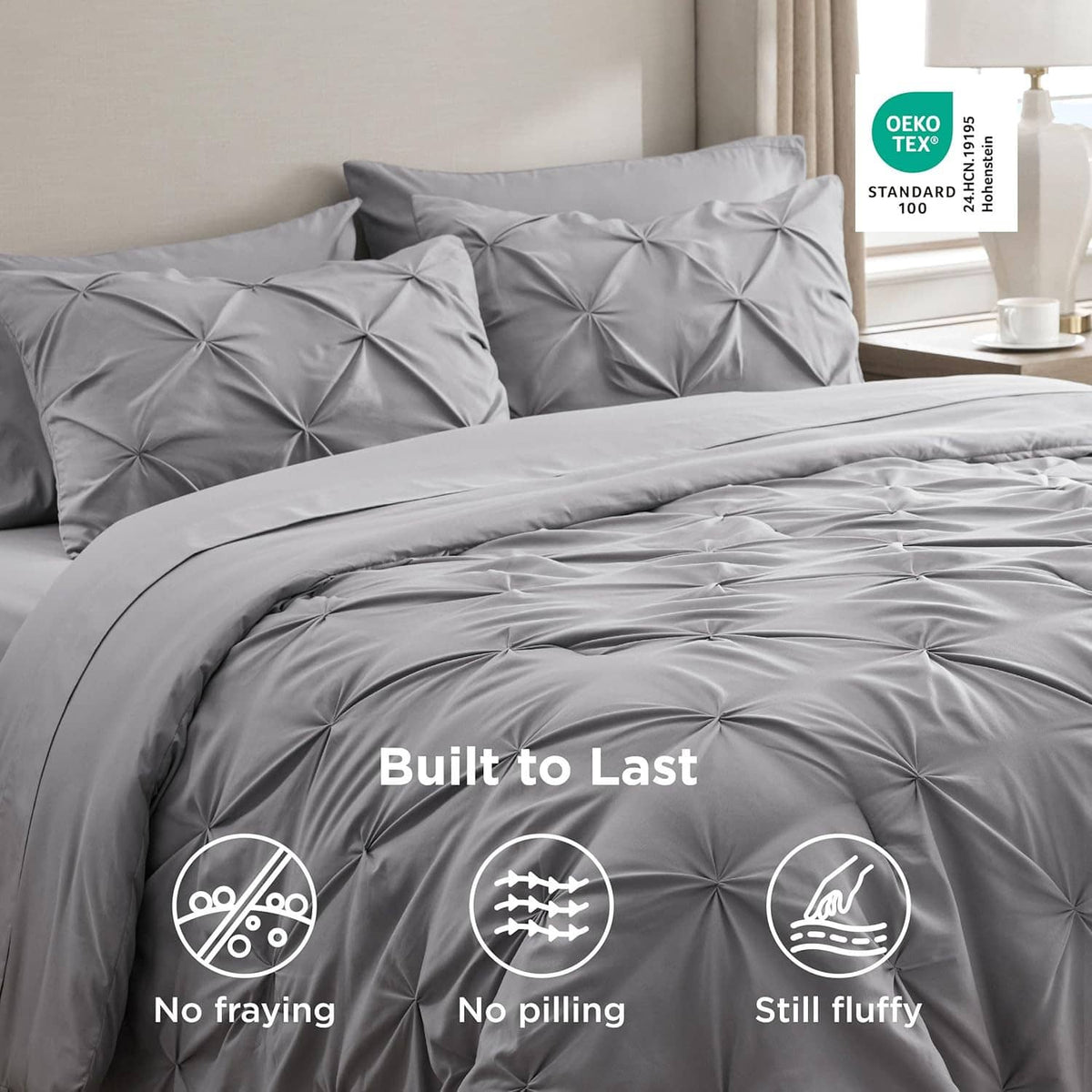 Grey queen comforter set with tufted pinch-pleat texture, pillow shams included