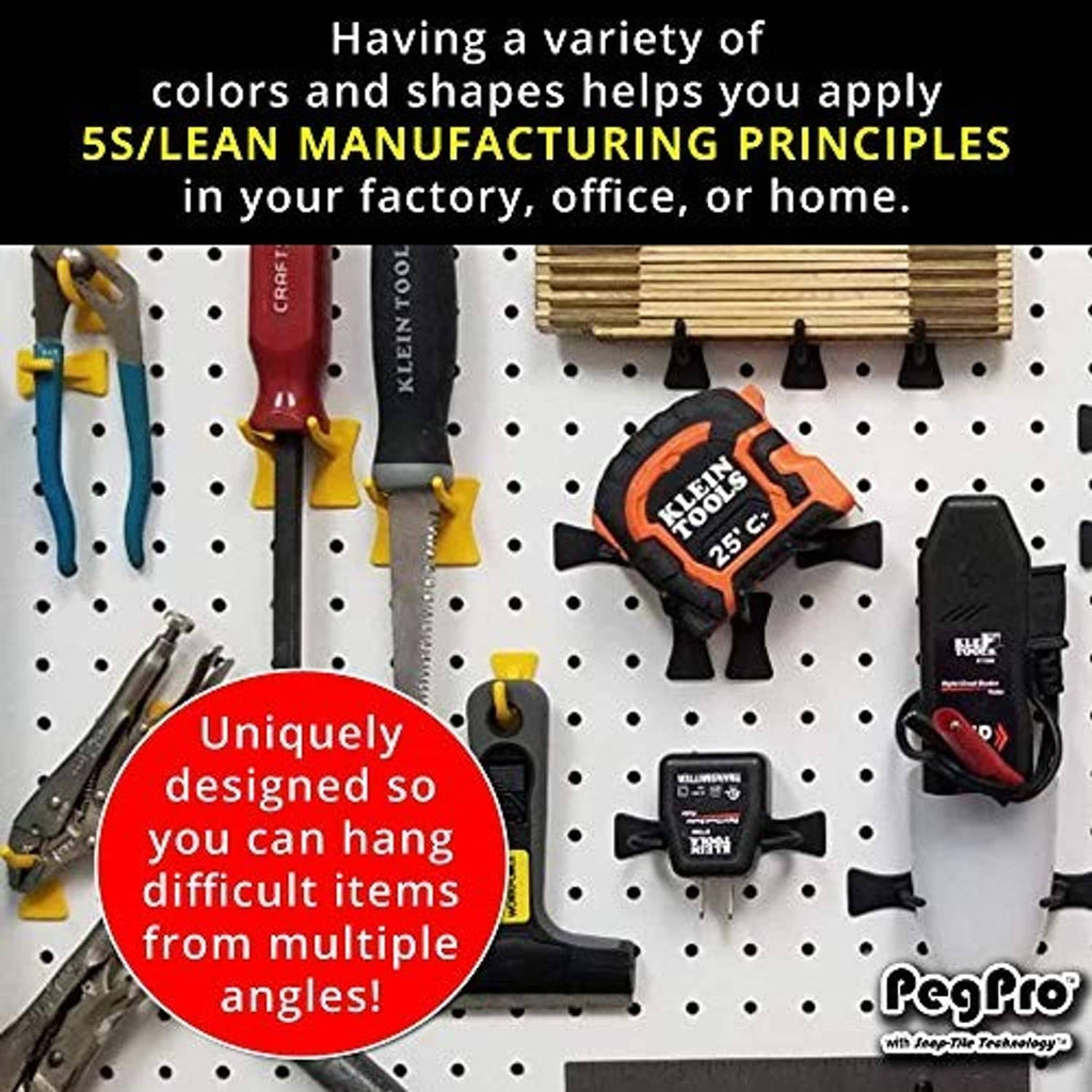 Pegboard organizer with assorted black tool hooks on a perforated board