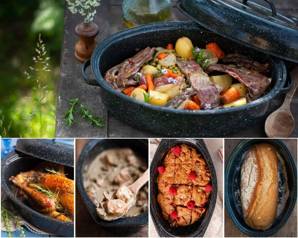 Oval grill roasting pan with lid, black speckled finish, holding cooked chicken and vegetables