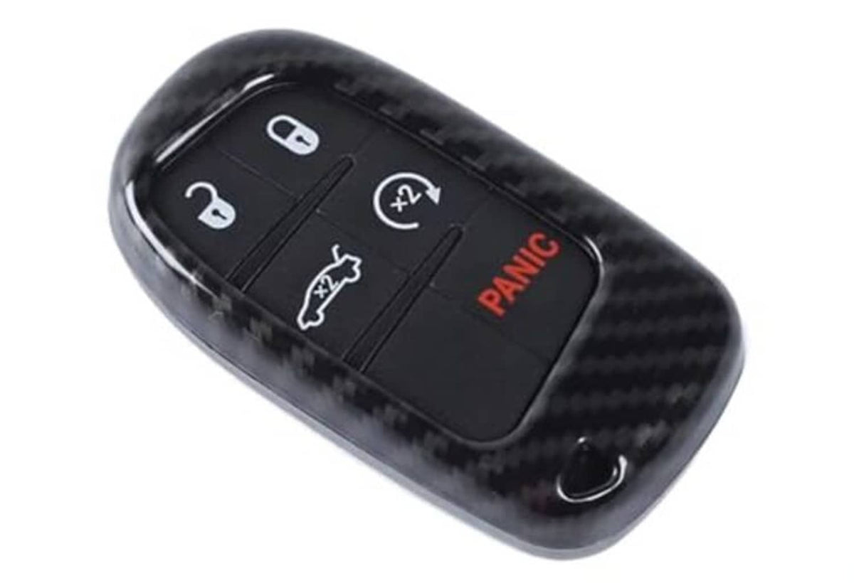 Glossy black carbon fiber key fob shell, angled view with key ring hole