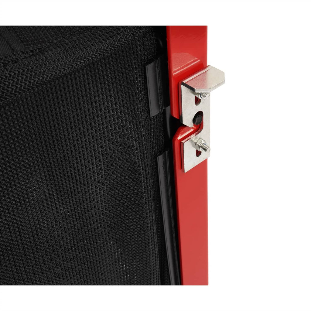 Corner latch detail: black bag edge secured to red frame with metal bracket