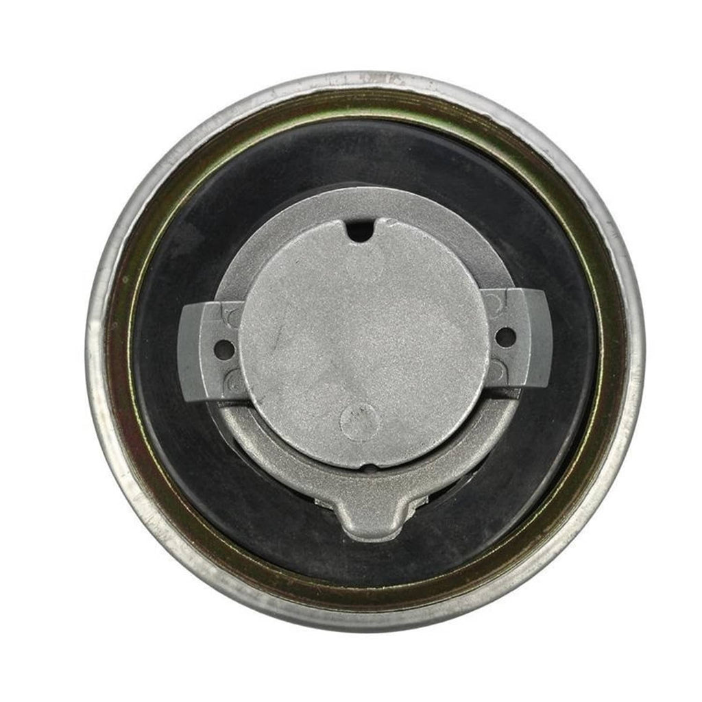 Fuel tank cap lock cover underside with circular lock mechanism