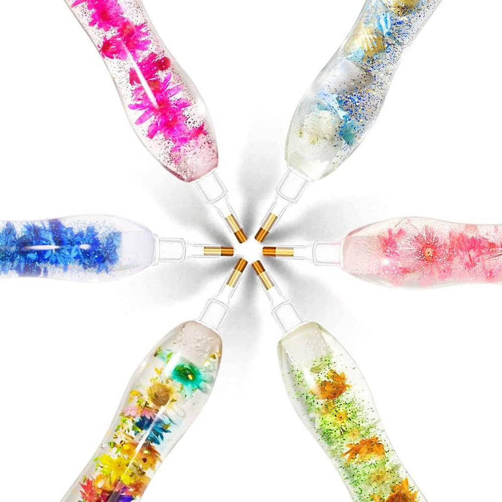 Five multicolor glitter gem picker pens with clear tips arranged in a star layout