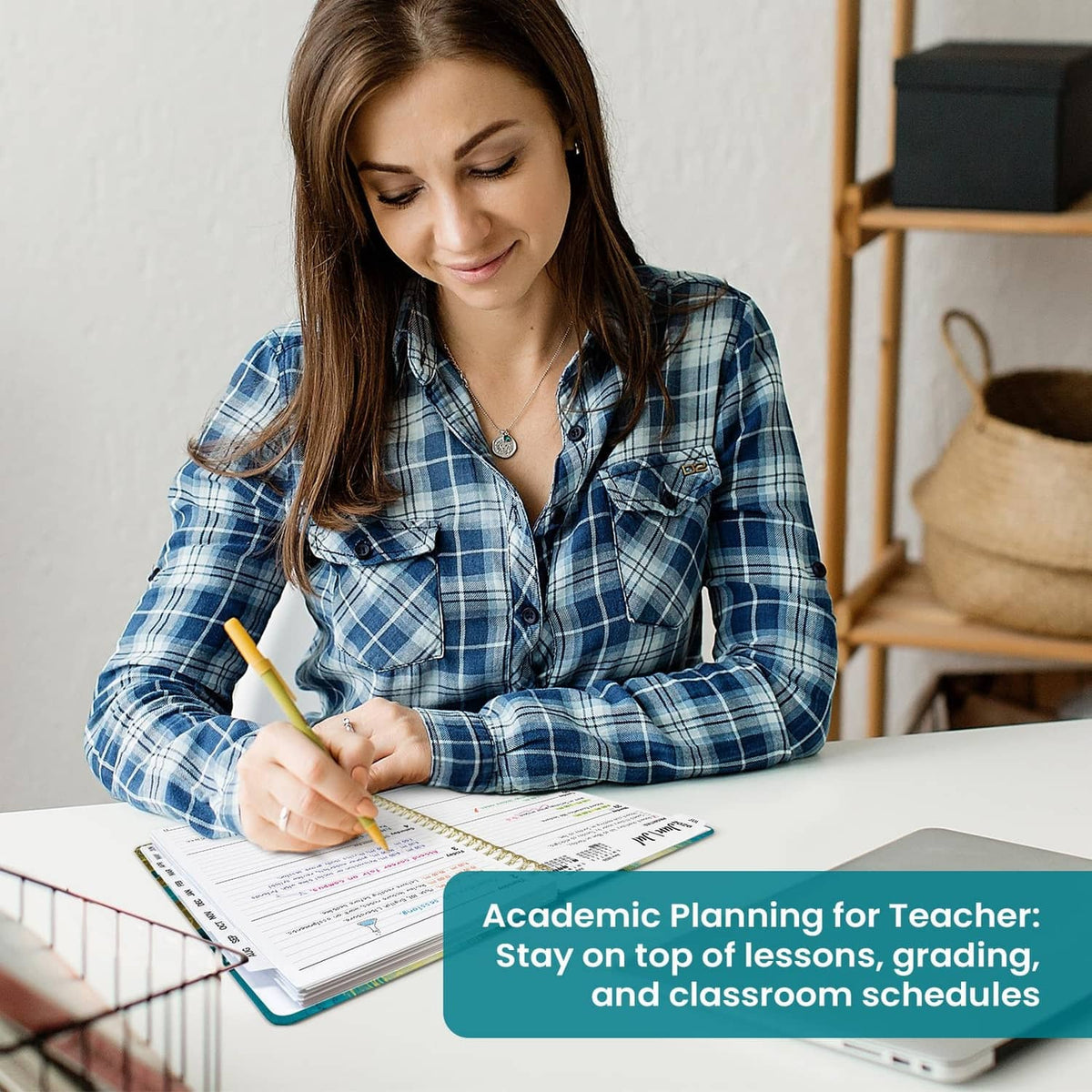 Spiral planner open on desk with weekly schedule pages for academic planning
