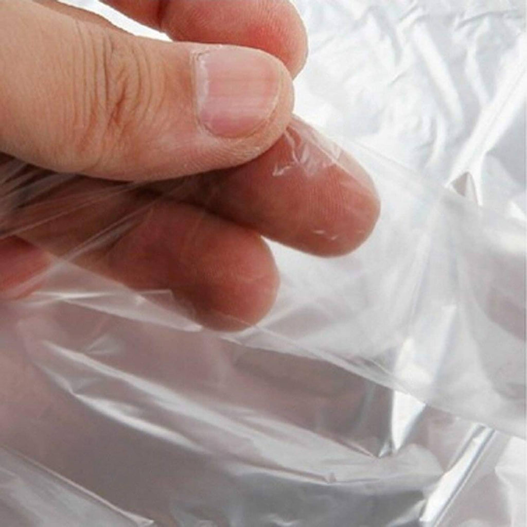 Hand pinching transparent plastic garment cover material, glossy finish