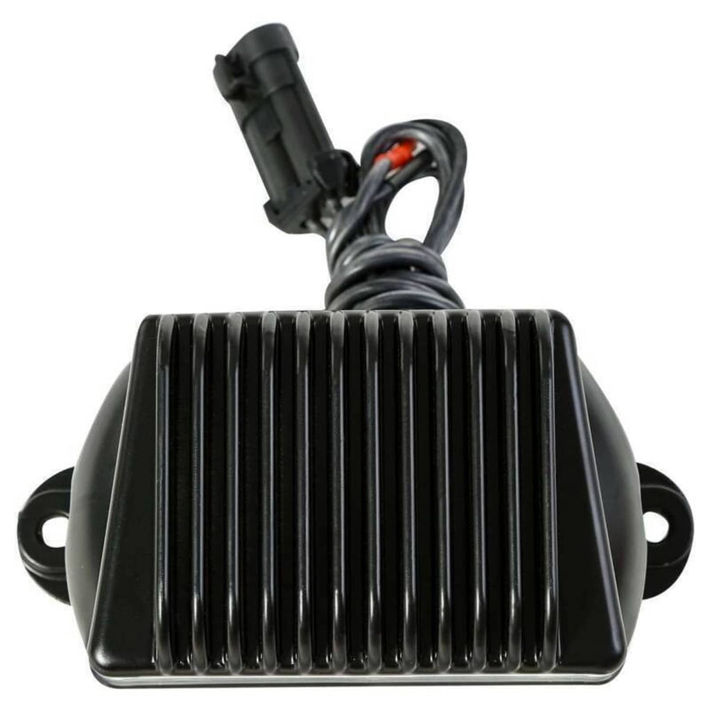 Close-up of black finned voltage regulator heat sink with mounting studs