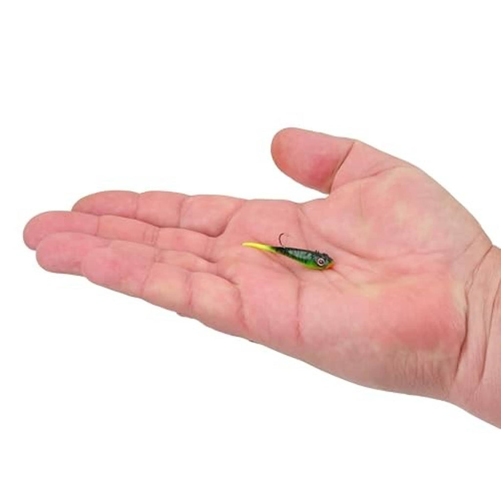 Neon green Firetiger soft plastic swimbait on a person’s open palm
