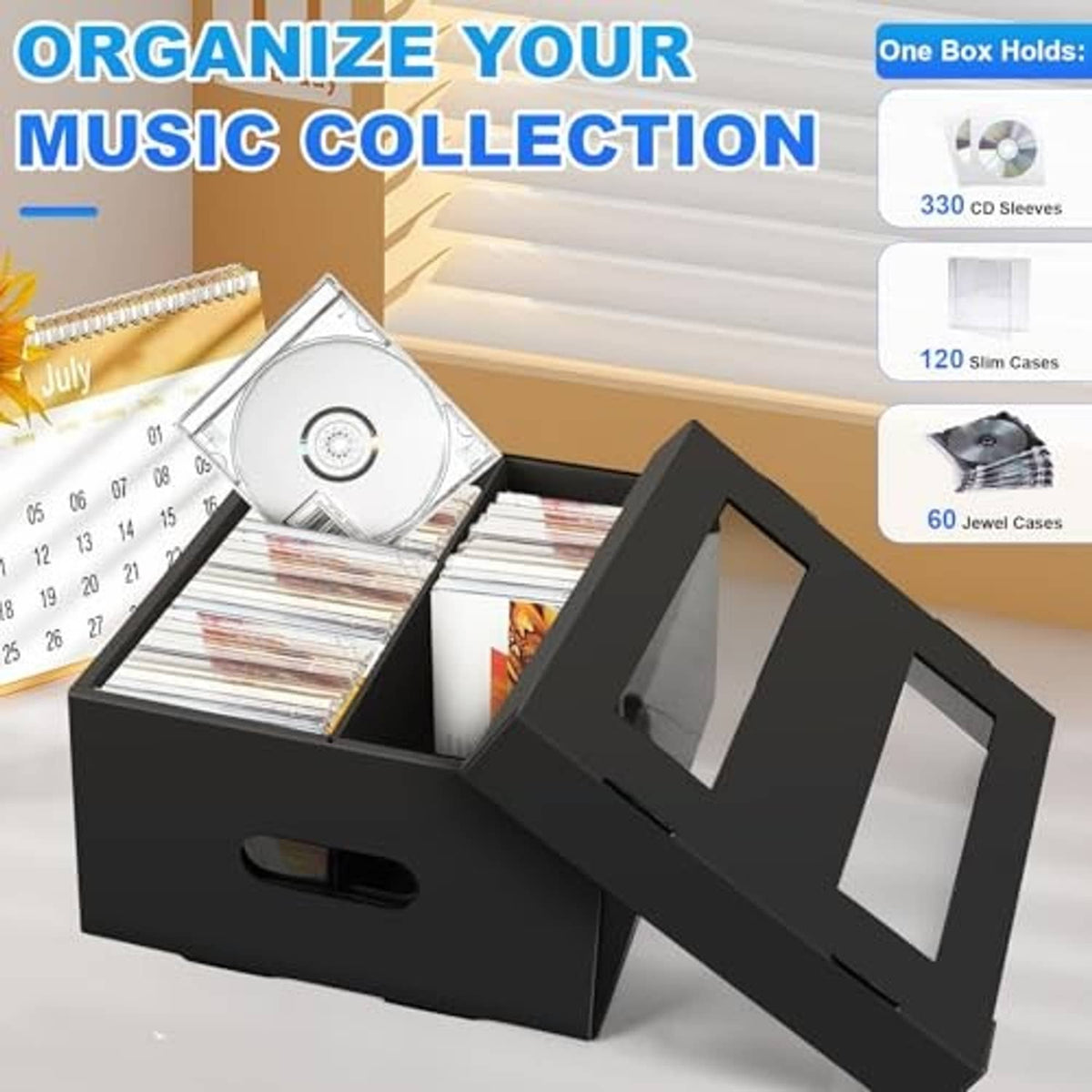 Black 2-compartment CD storage box holding CDs, lid hinged and open.