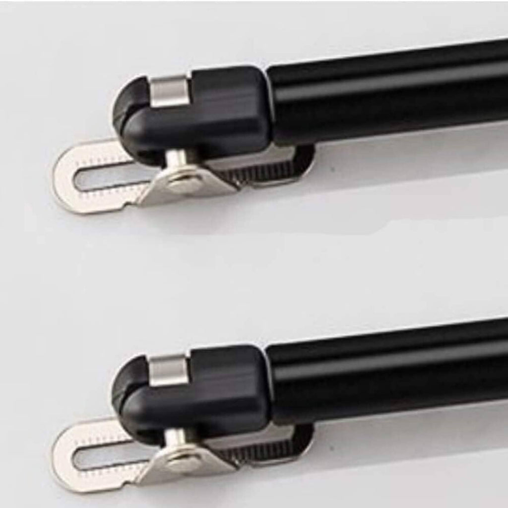 Close-up of black gas strut with metal mounting bracket and rod end cap
