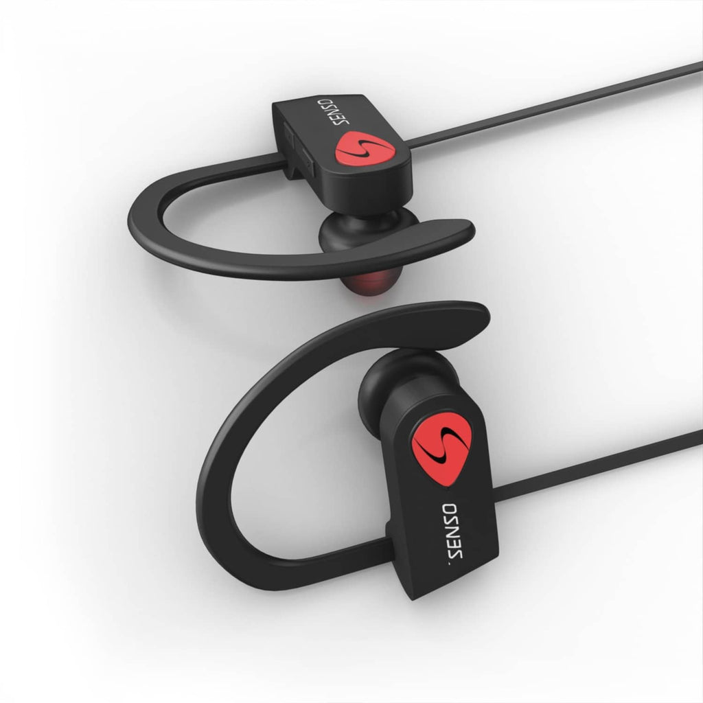 Black Bluetooth earbuds with mic on curved surface, over-ear stability design