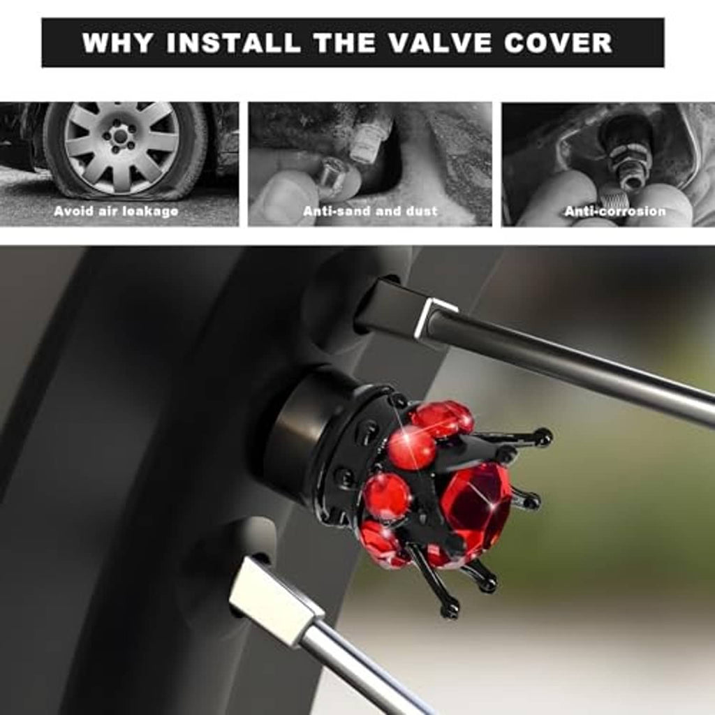 Red jeweled crown tire valve cap mounted on a dark wheel valve stem