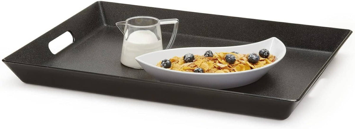 Black non-skid serving tray with handle cutout, holding a white bowl of food