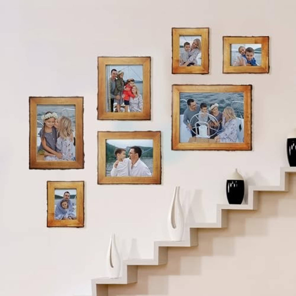 Rustic wood photo frame set with several small openings arranged on a wall