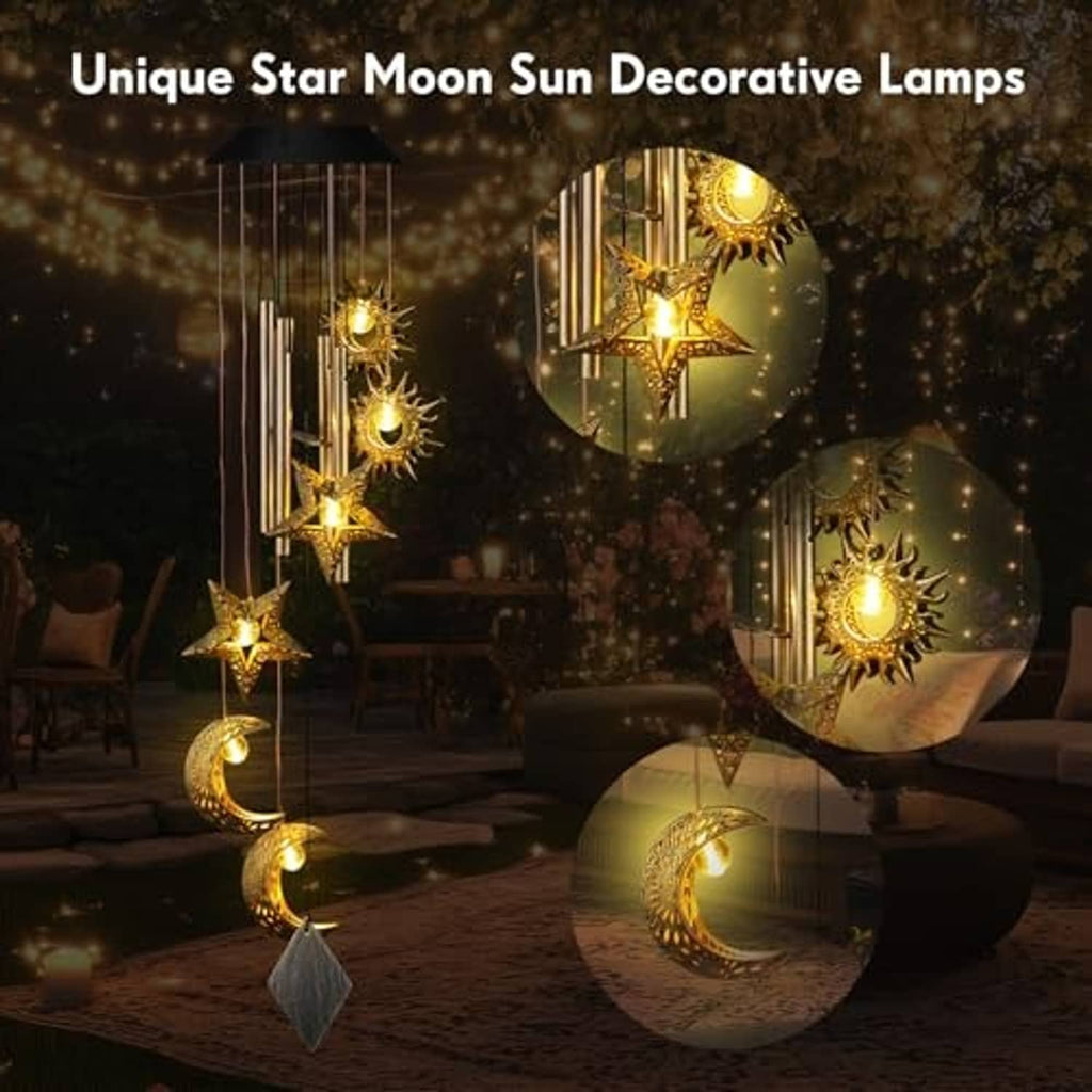 Outdoor solar wind chime with glowing star and moon charms on vertical light rods