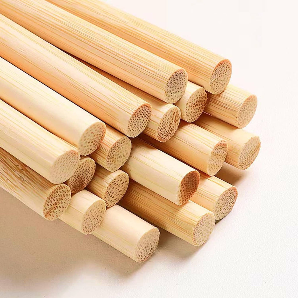 Natural bamboo dowel rods, multiple short cylindrical sticks stacked together