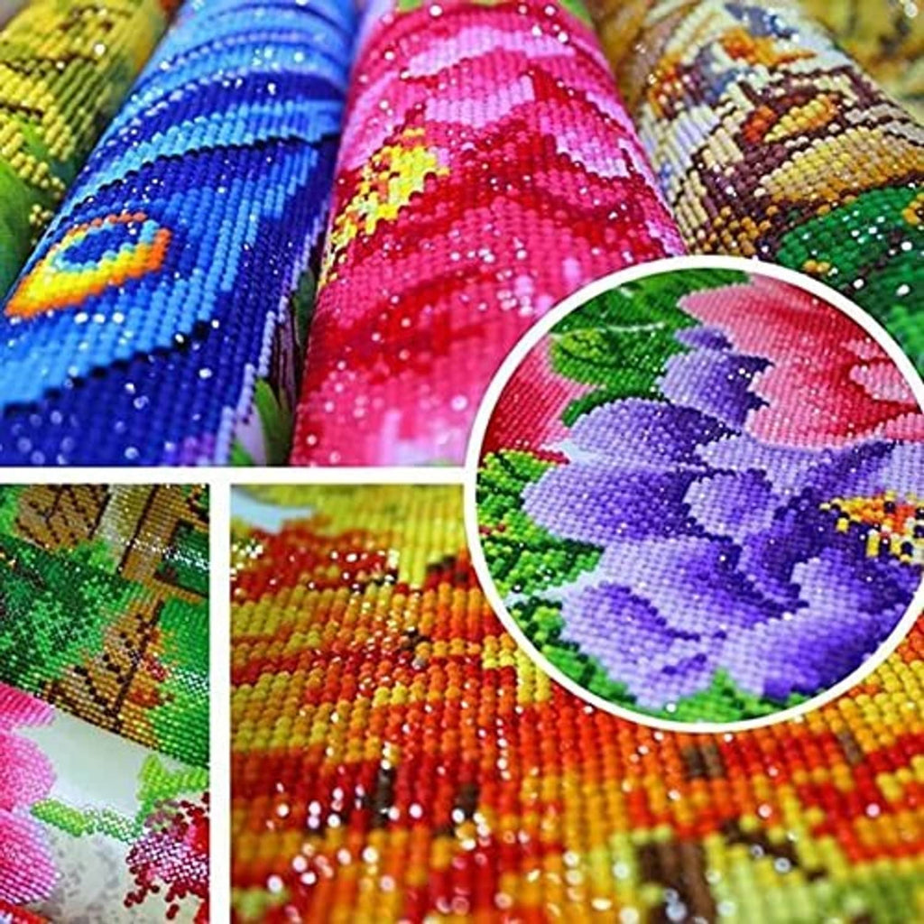 Colorful round rhinestone diamonds for 5D diamond painting, close-up on stitched canvas