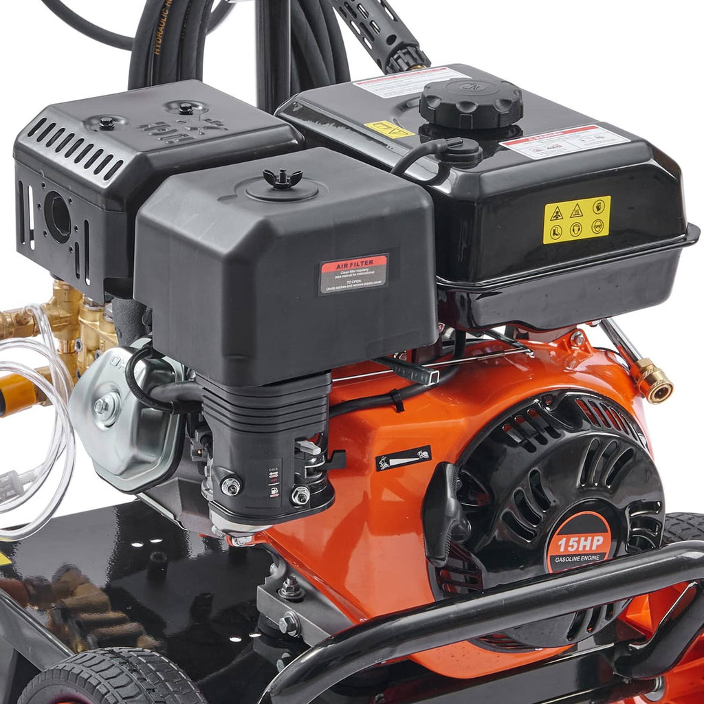 Close-up of orange gas engine and black pump housing on pressure washer