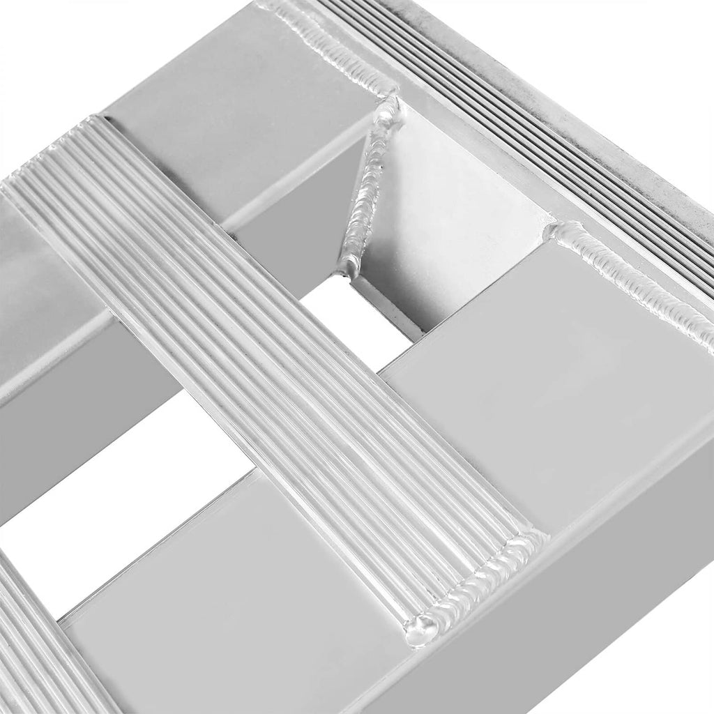 Close-up of aluminum ramp frame with ribbed traction rails and cross braces