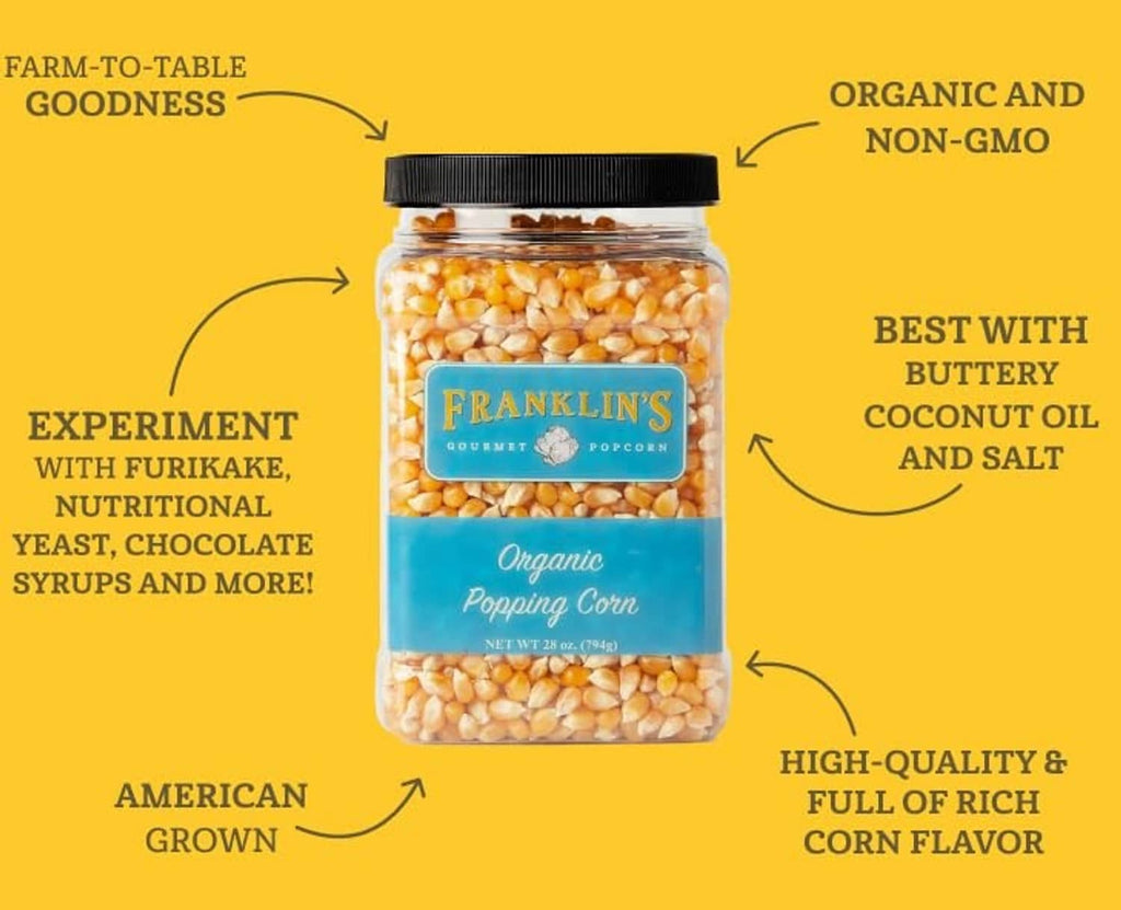Organic popcorn kernels in clear jar with black lid, Franklin’s Gourmet front label.