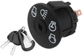 Black ignition switch with key, round bezel with control position icons