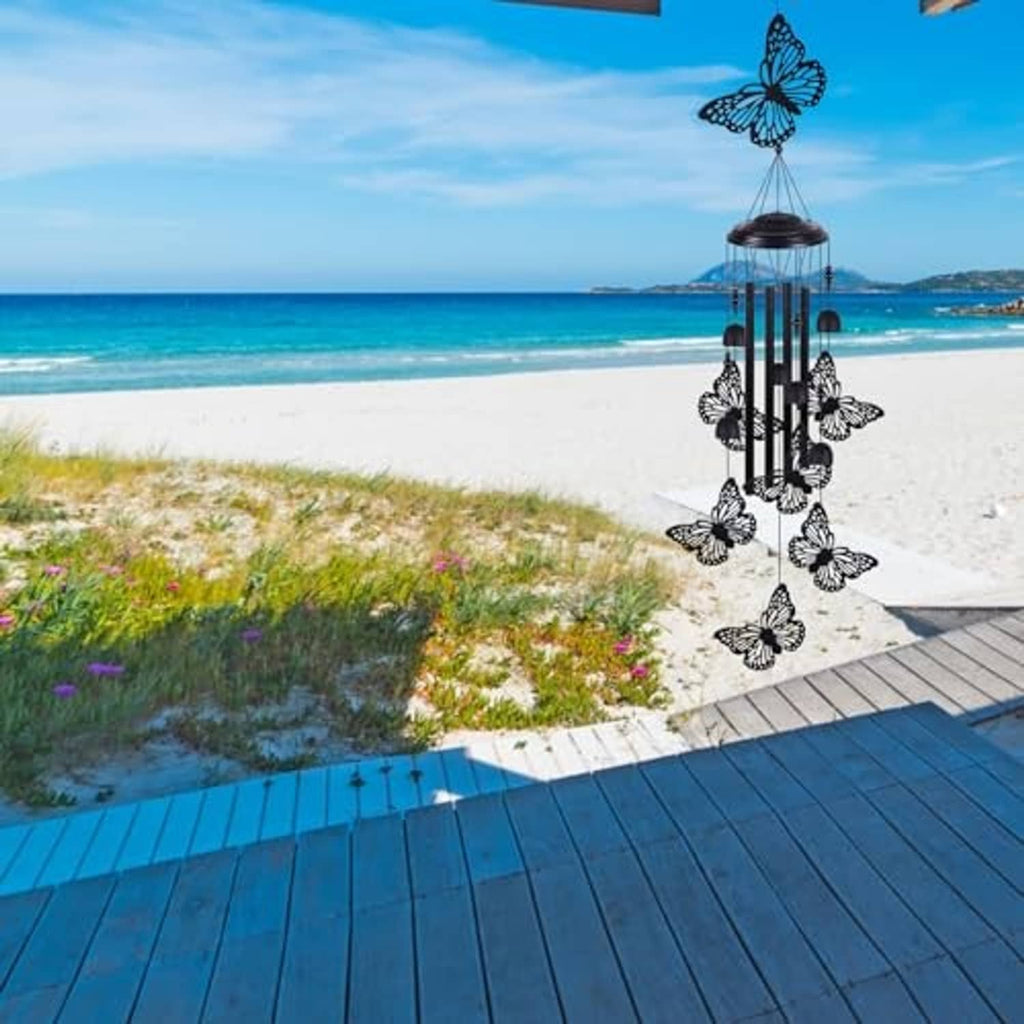 Black butterfly wind chime with hanging bars and butterfly ornaments